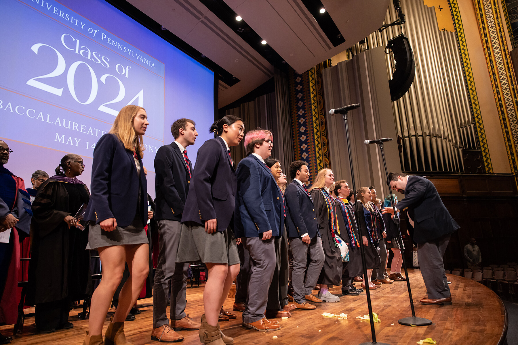 glee club on stage performing