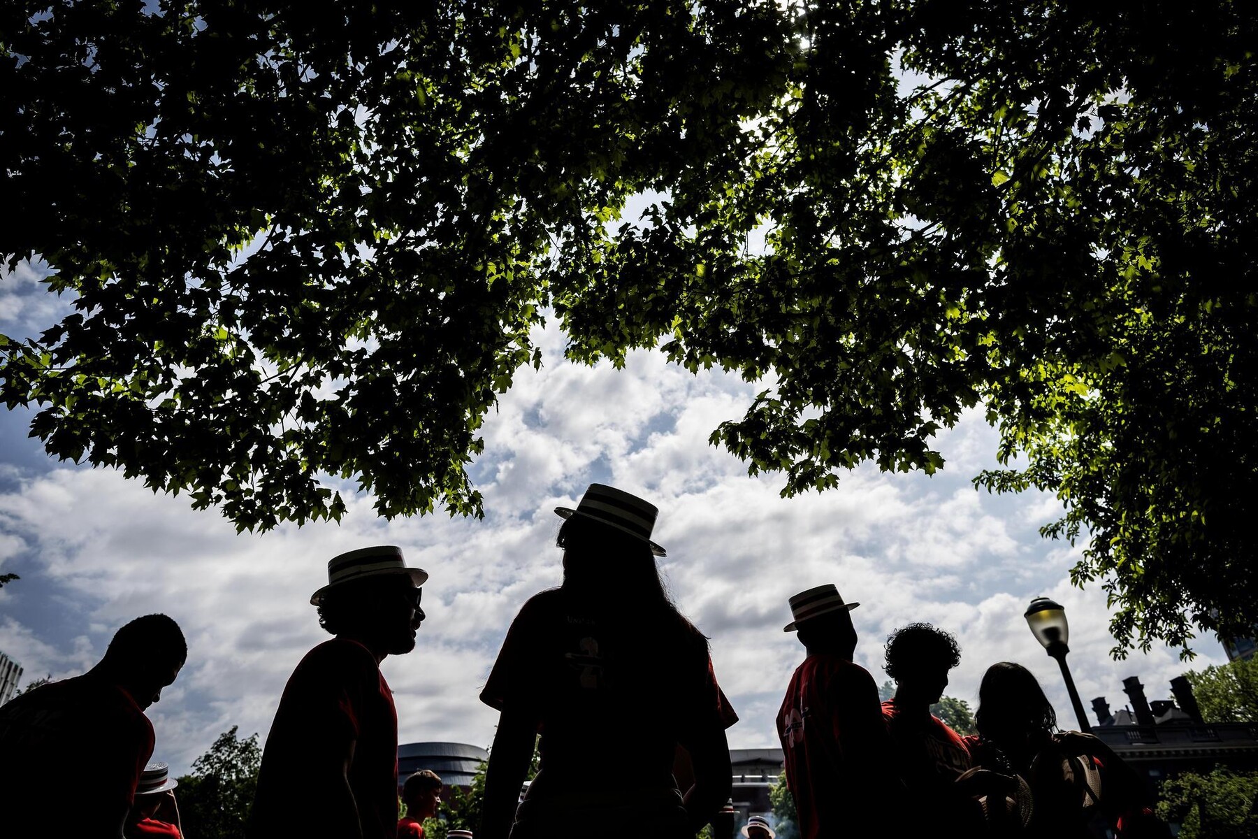 Students wearing Hey Day hats on College Green.