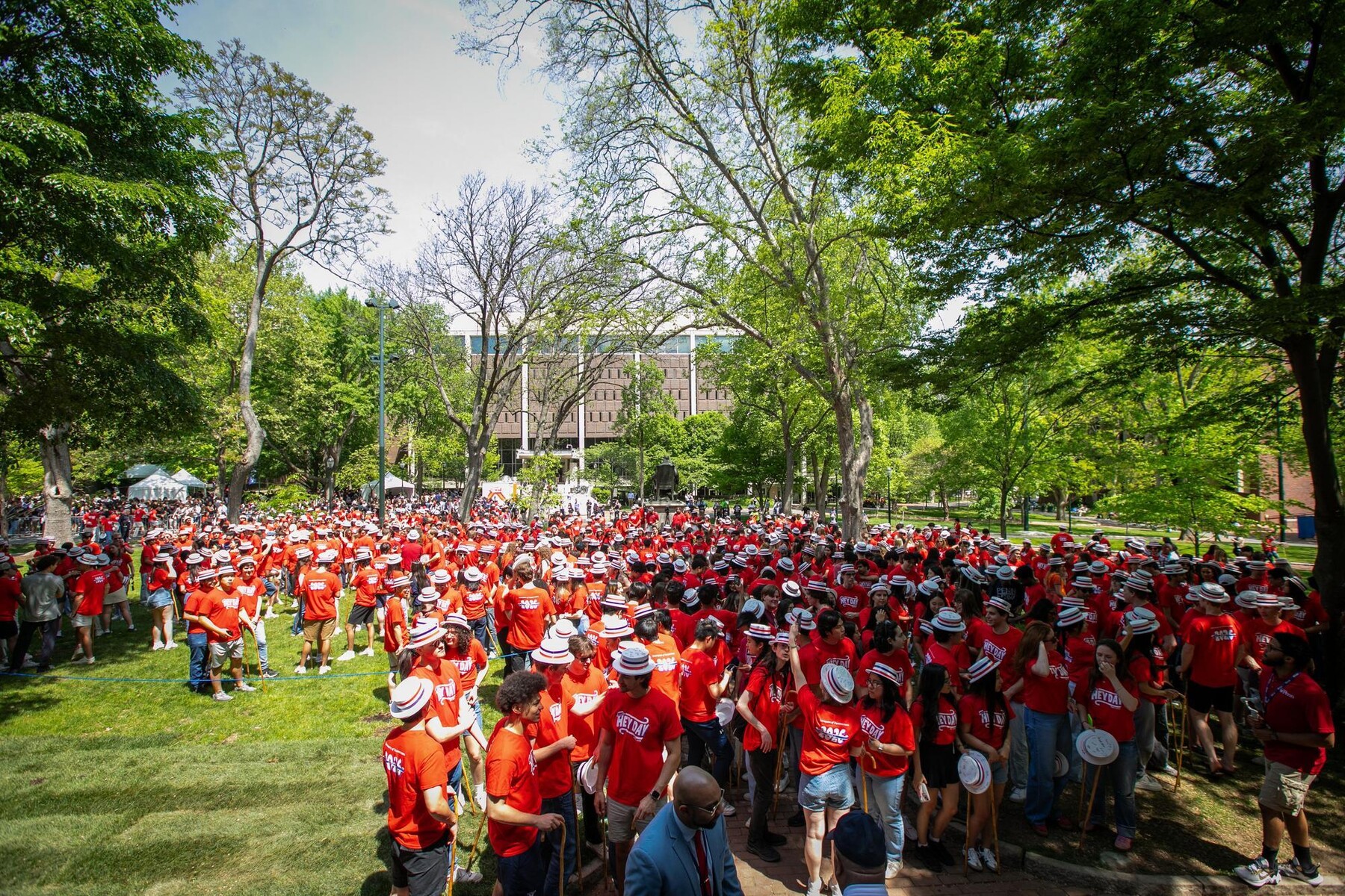 Penn students in matching shirts on College Green during Hey Day.