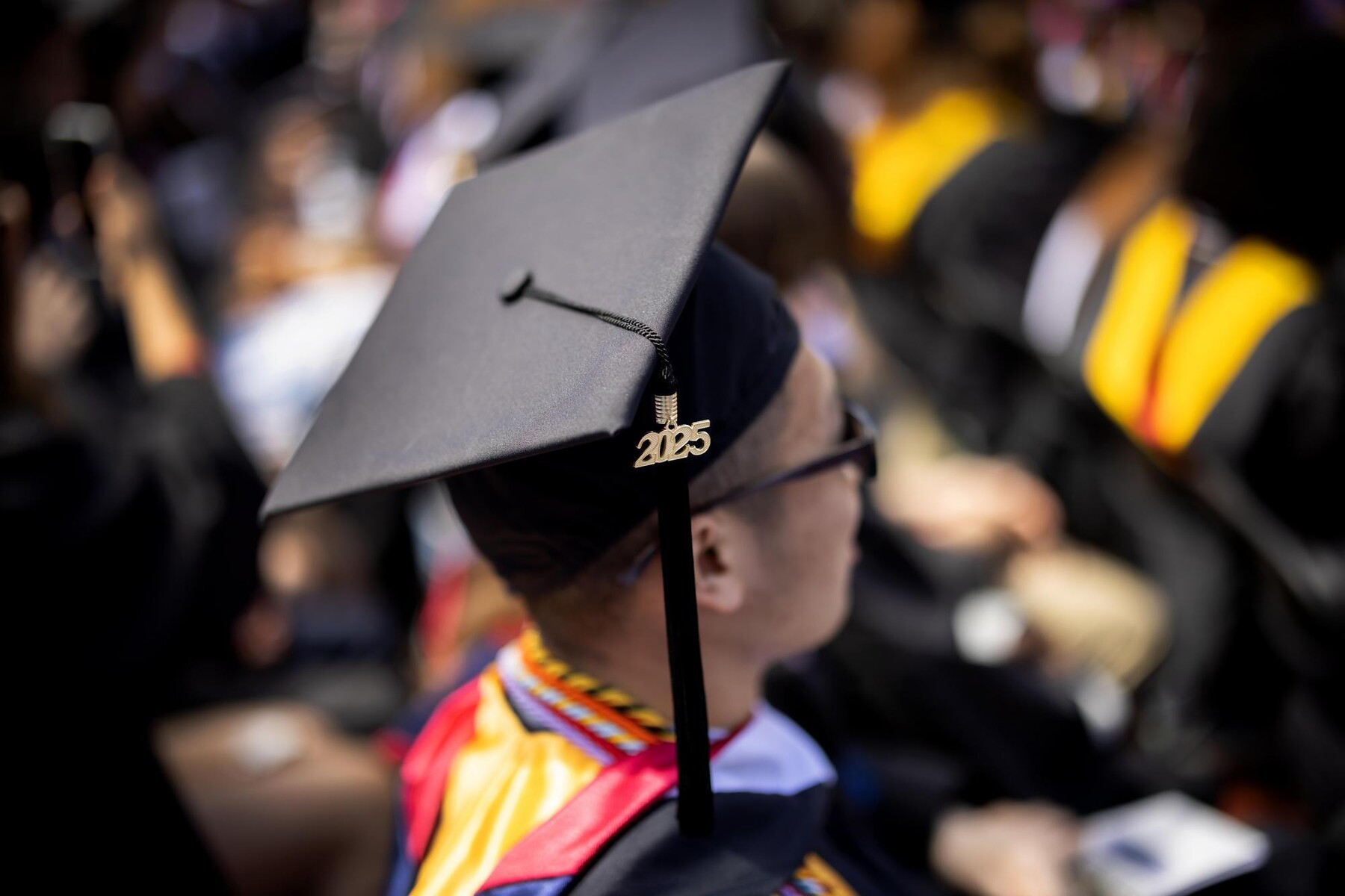 A Penn graduate’s mortarboard with a 2025 keychain.