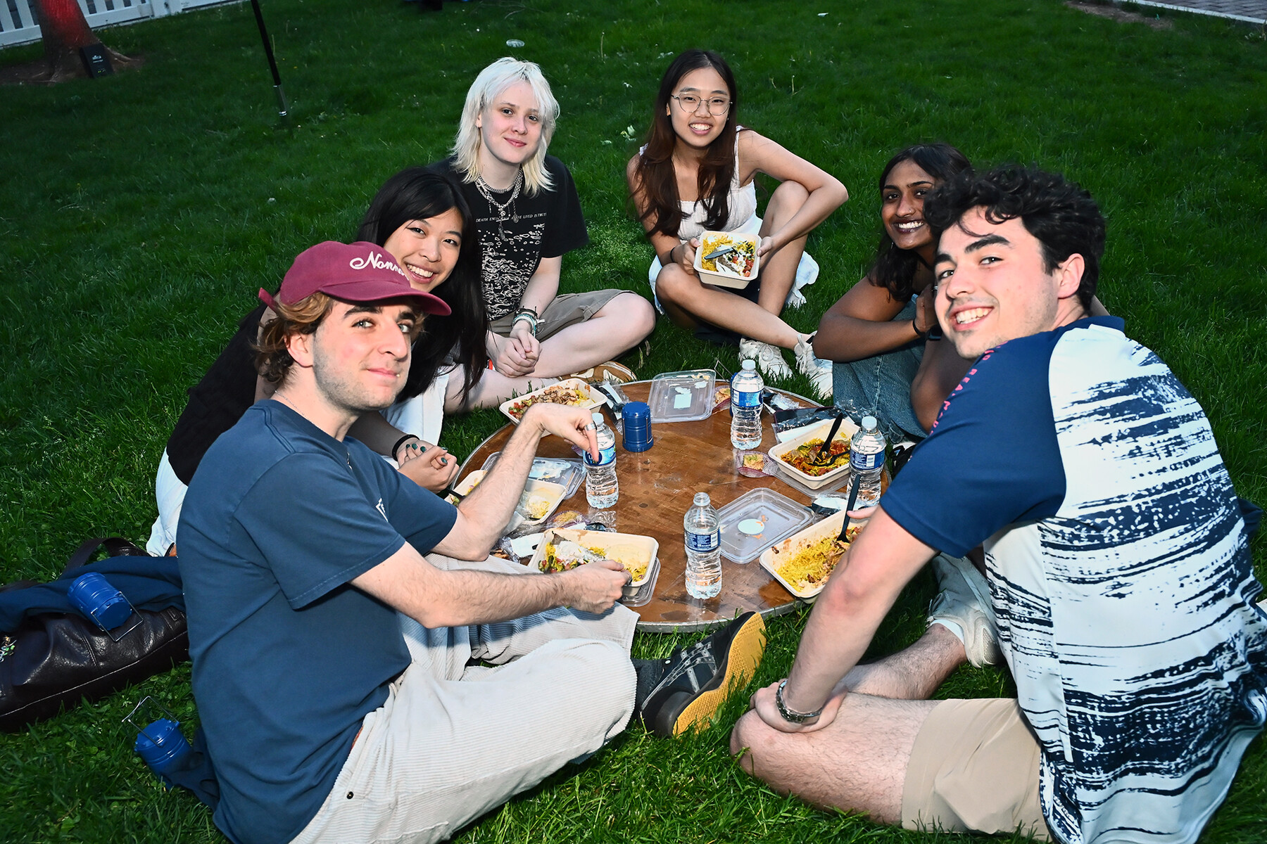 Students sitting on the lawn at Penn’s U-Night.