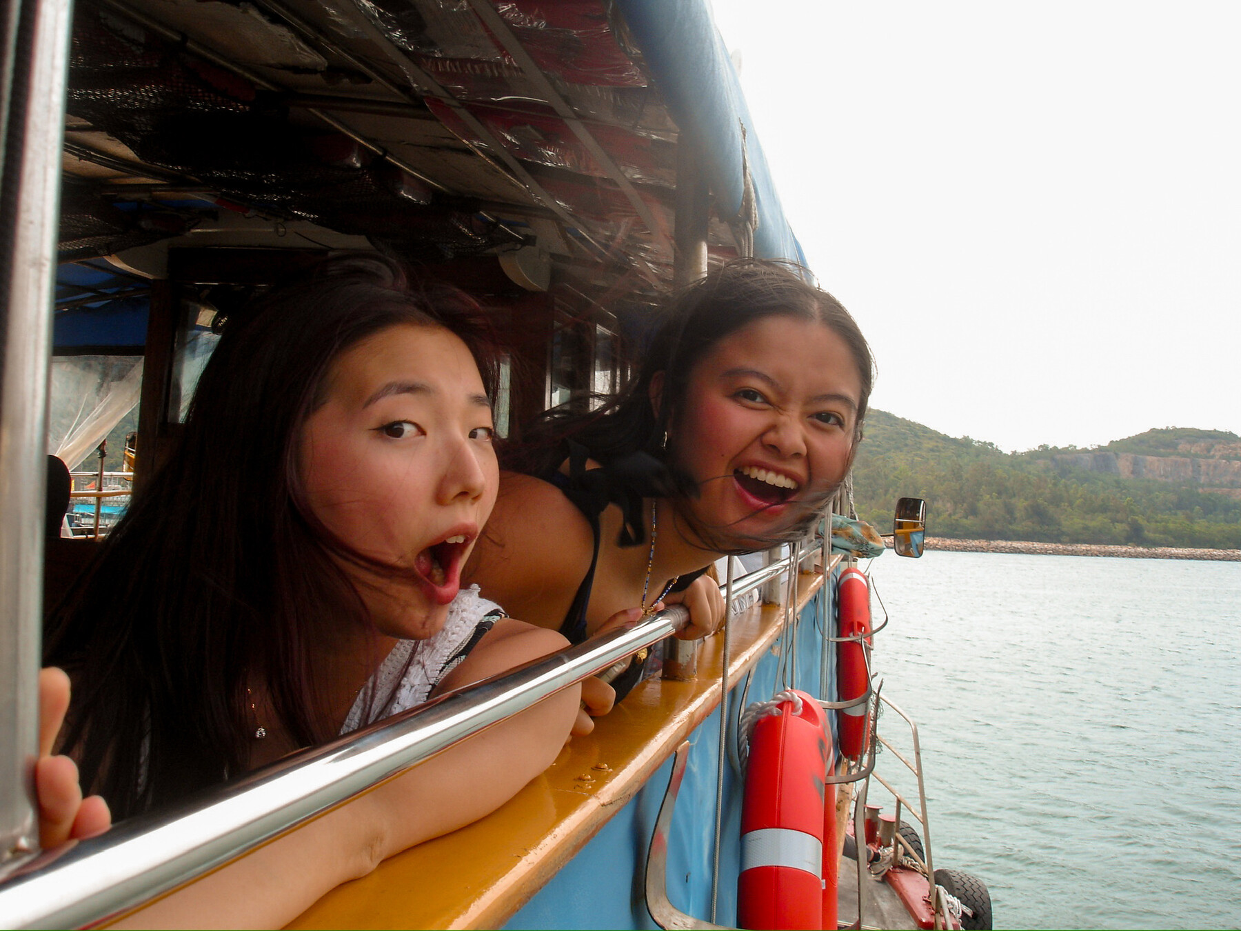 students on boat in water