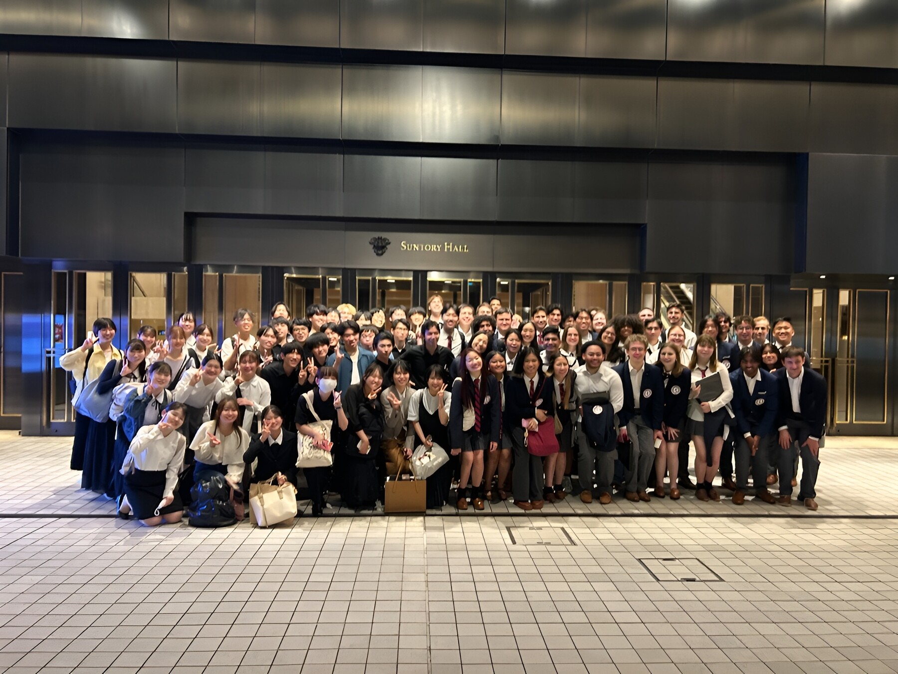 big group of students outside performance hall