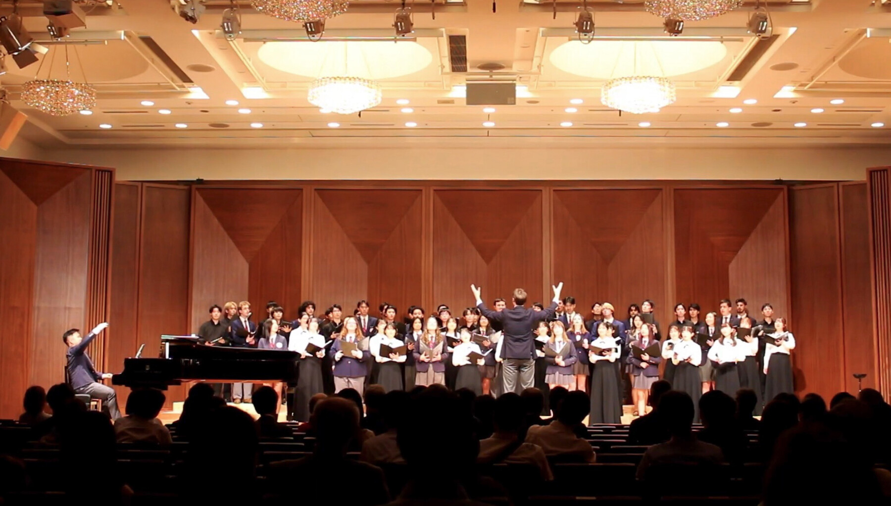 glee club performing on stage