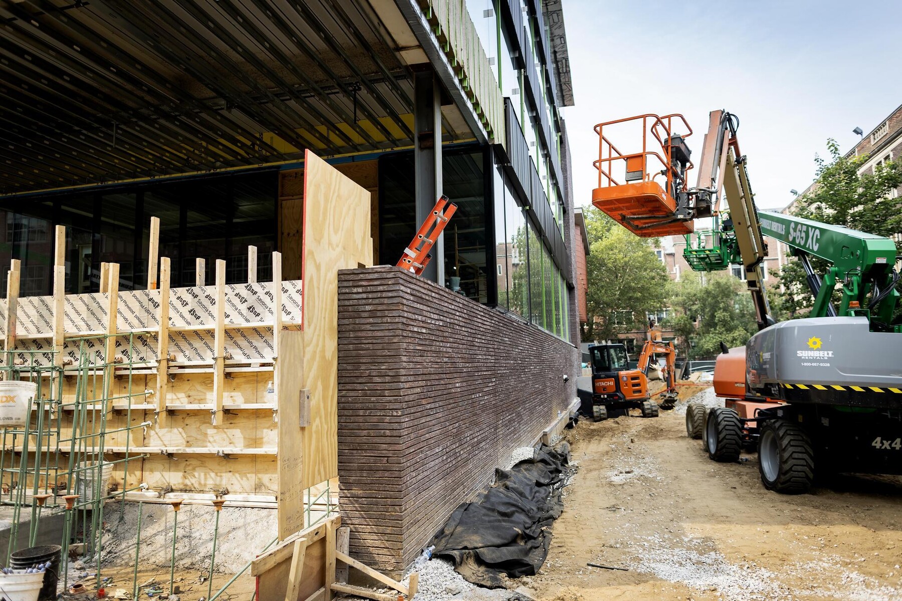 The exterior of Penn’s Weitzman School under construction.