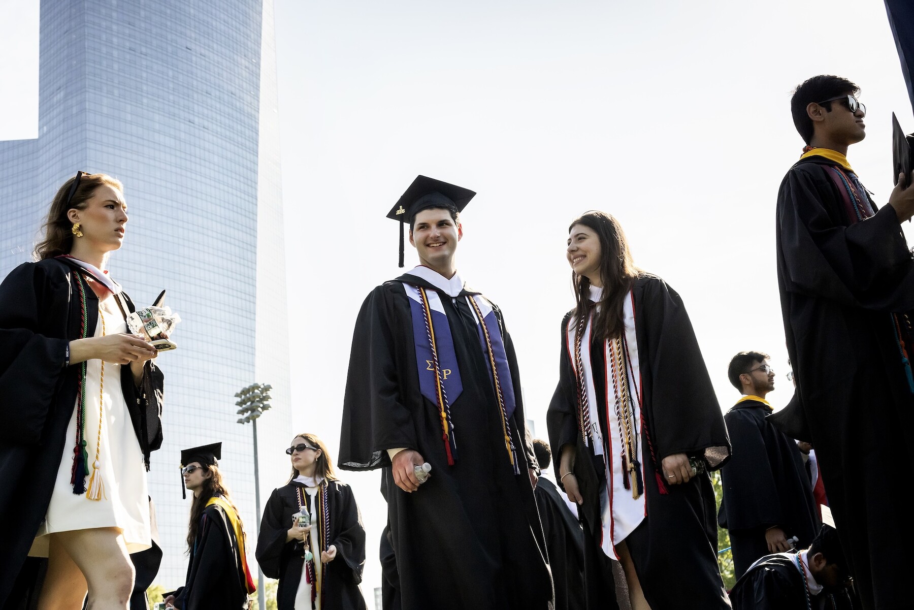Students in regalia lining up for Penn’s commencement.