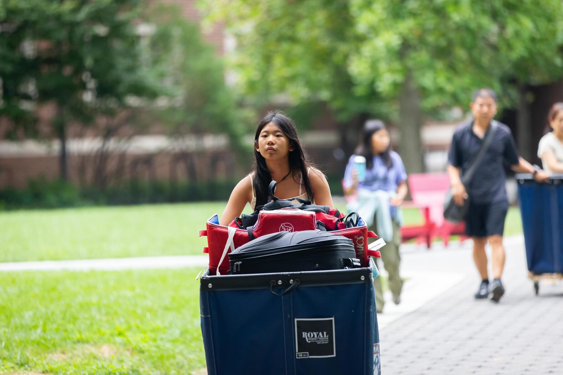 A student pushing a Move-In cart during Move-In.