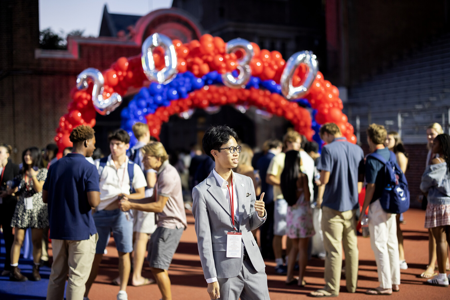 Students and a 2030 balloon arch on Franklin Field during Convocation.