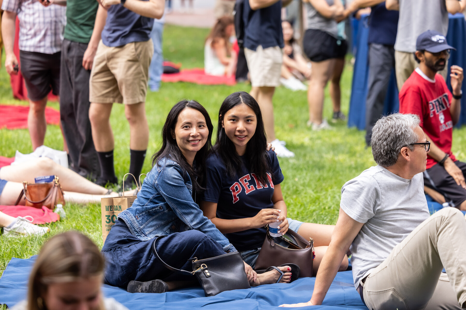 A Penn student and their parent at the family welcome picnic.