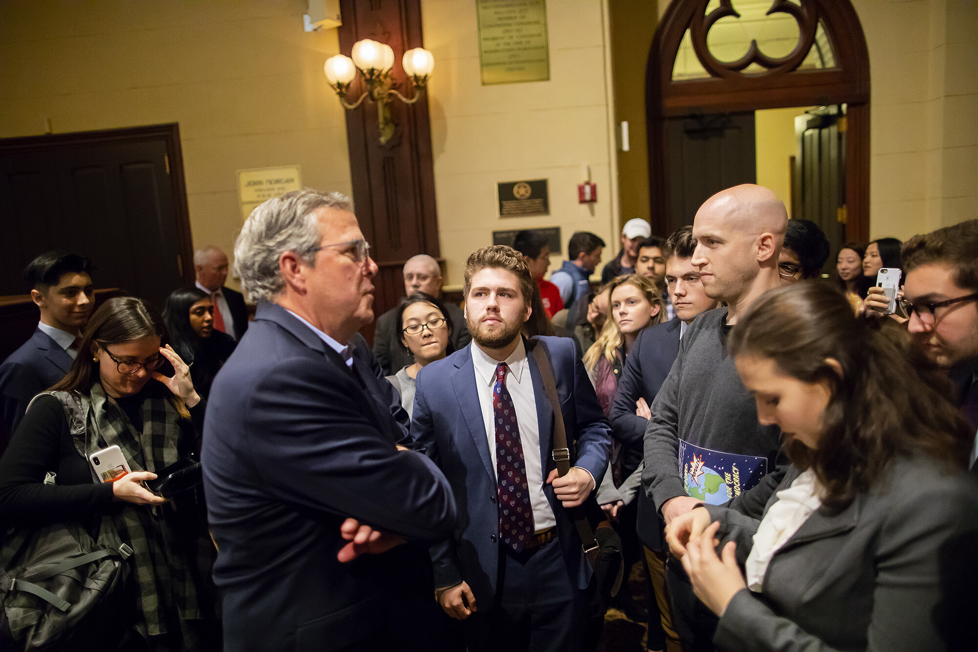 Bush-standing-chatting-with-students-in-crowd