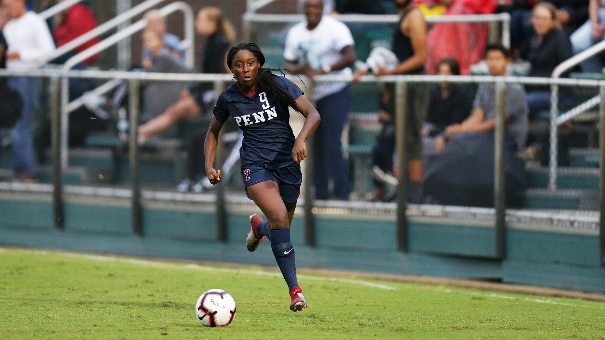 Stevens kicks the ball down the field