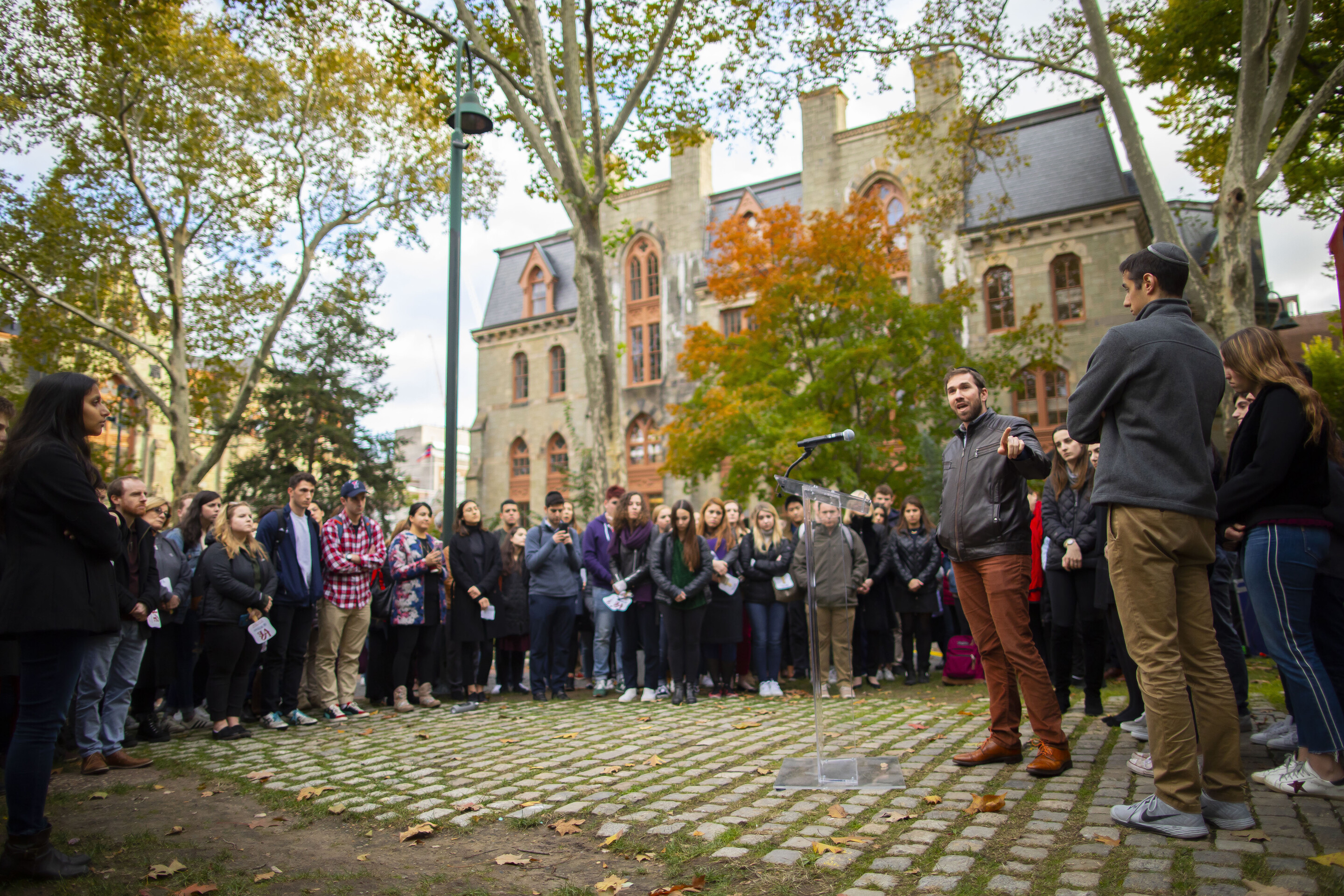 the vigil crowd standing in front of College Hall on Penn campus