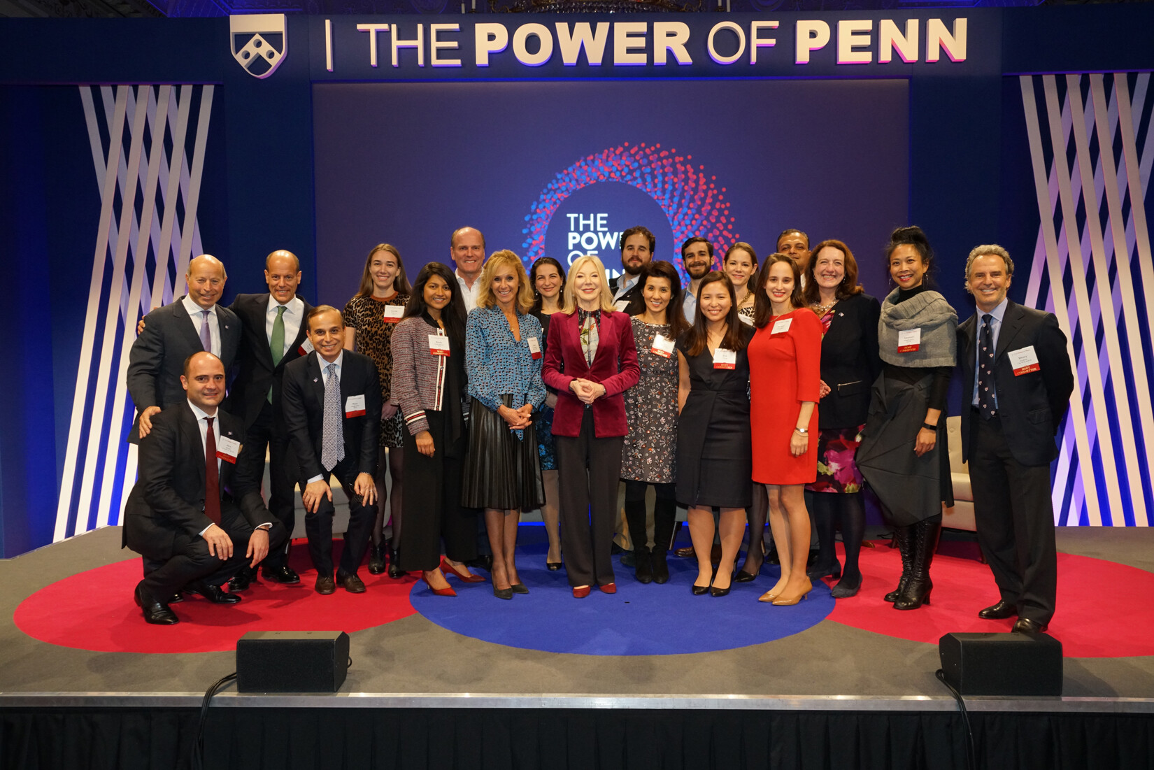 President Gutmann is joined on stage by alumni