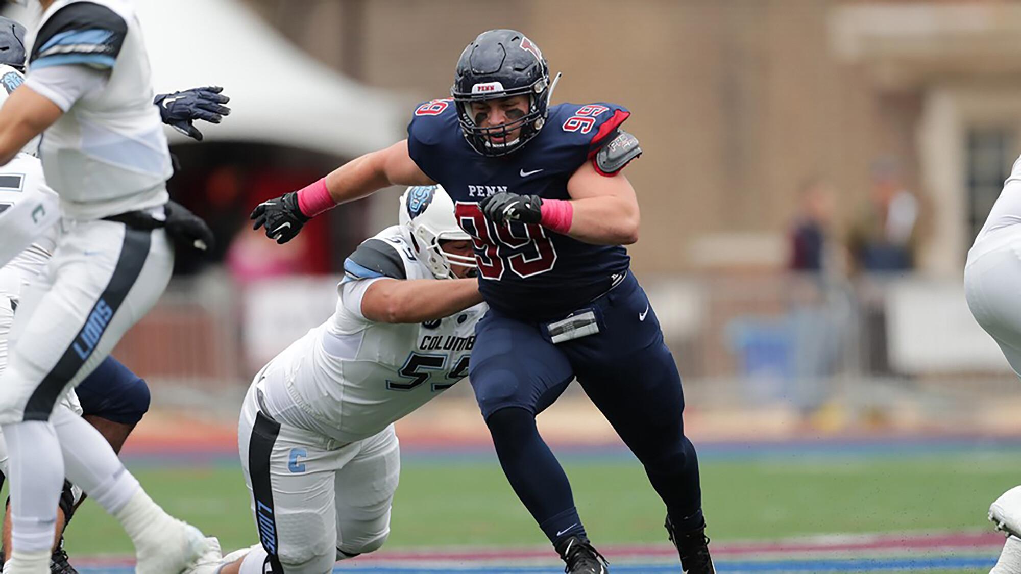 Lineman Cooper Gardner rushes the quarterback