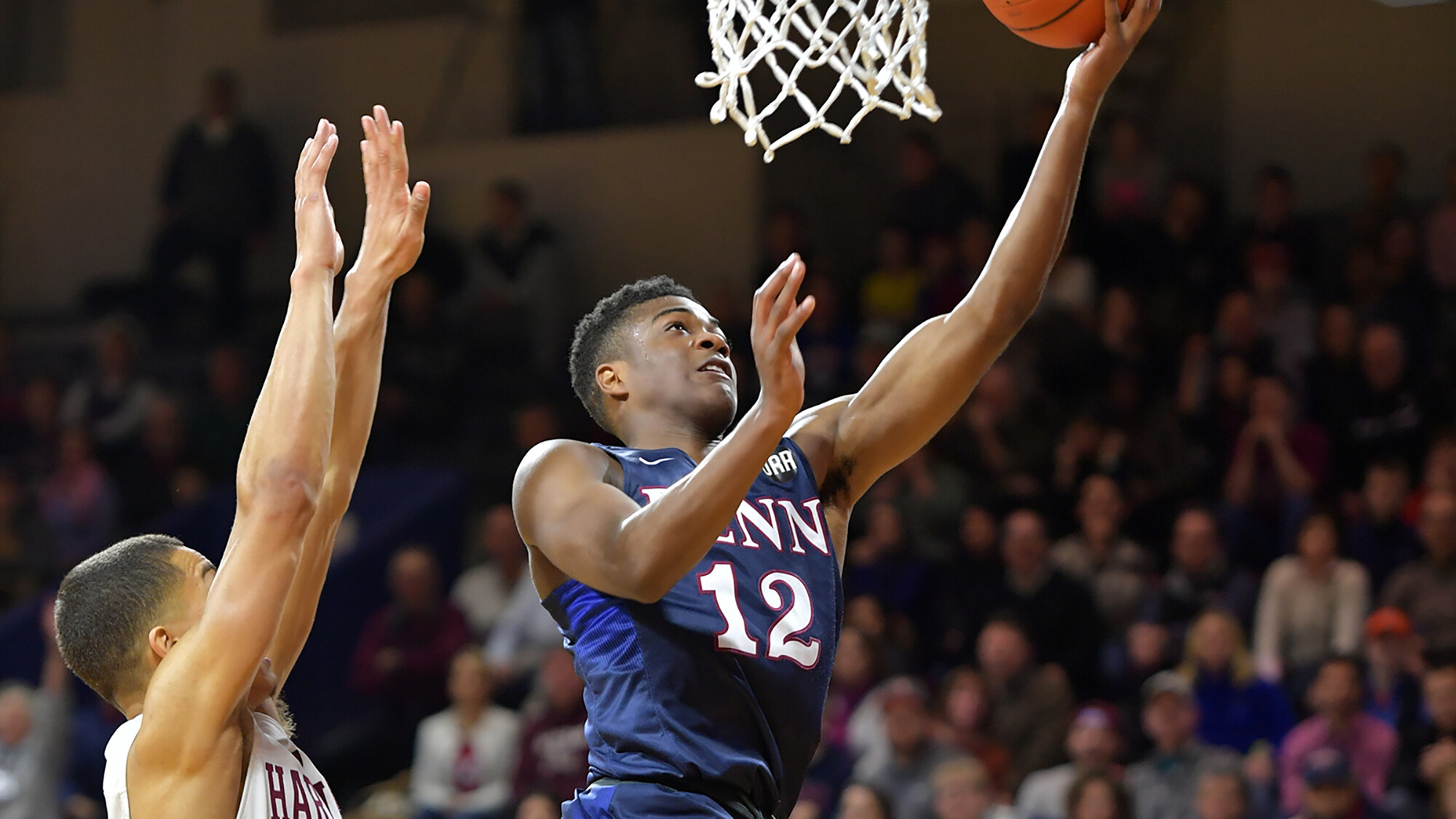 Goodman lays the ball in against Harvard