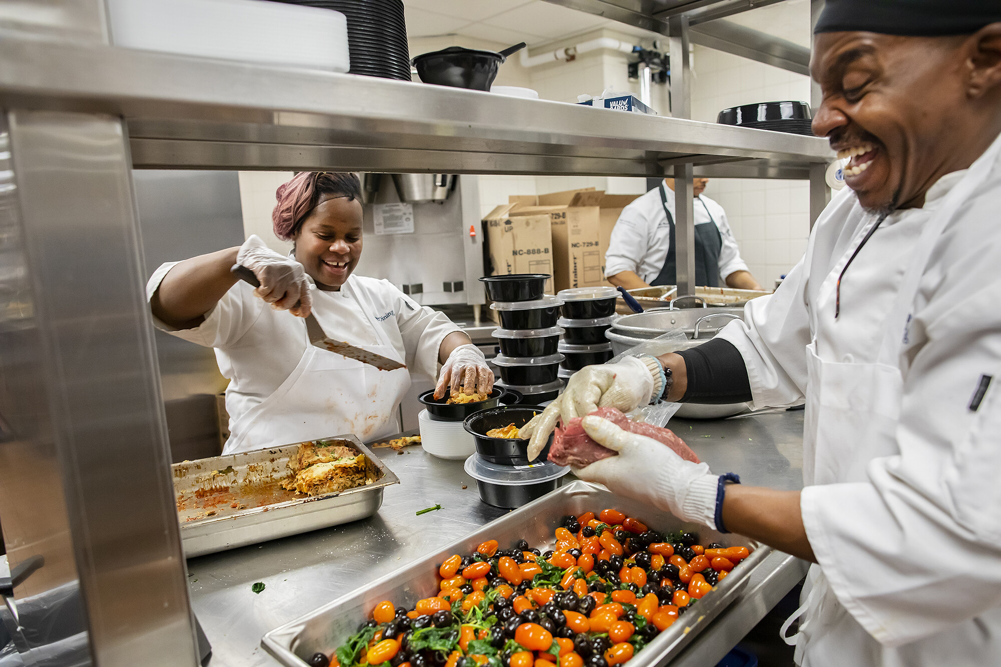 prepping food at penn dining in the kitchen