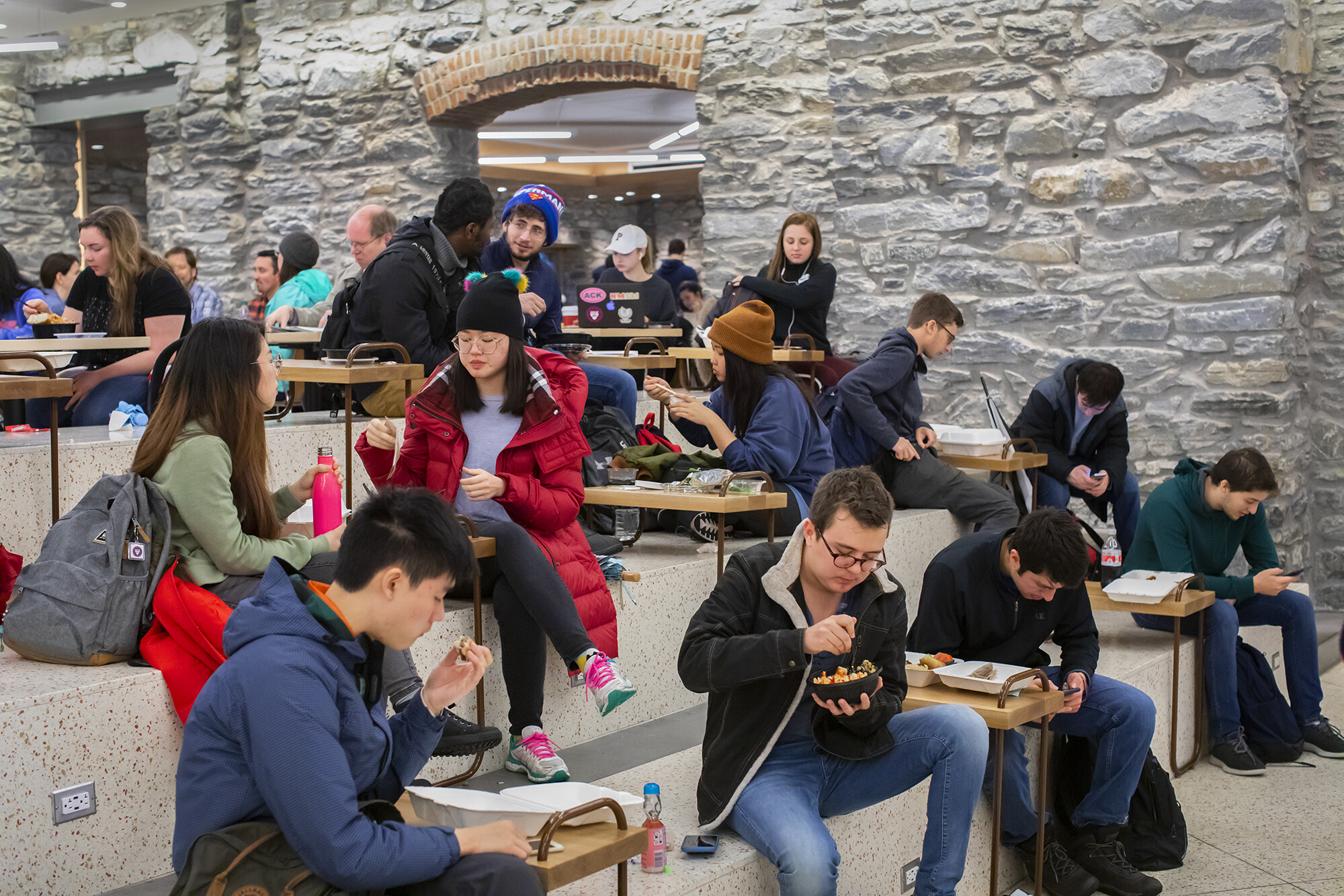 students eating lunch at houston hall