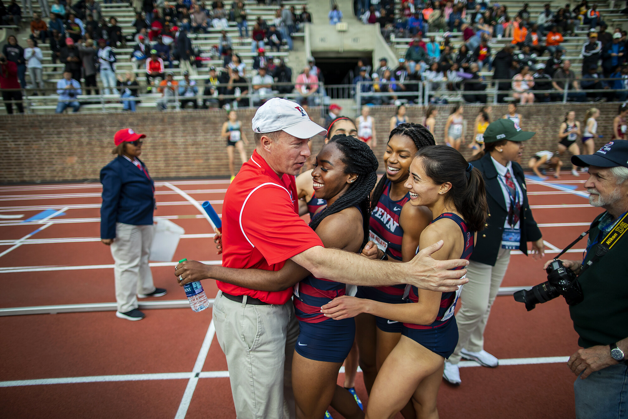 Trackside celebration with coach and team
