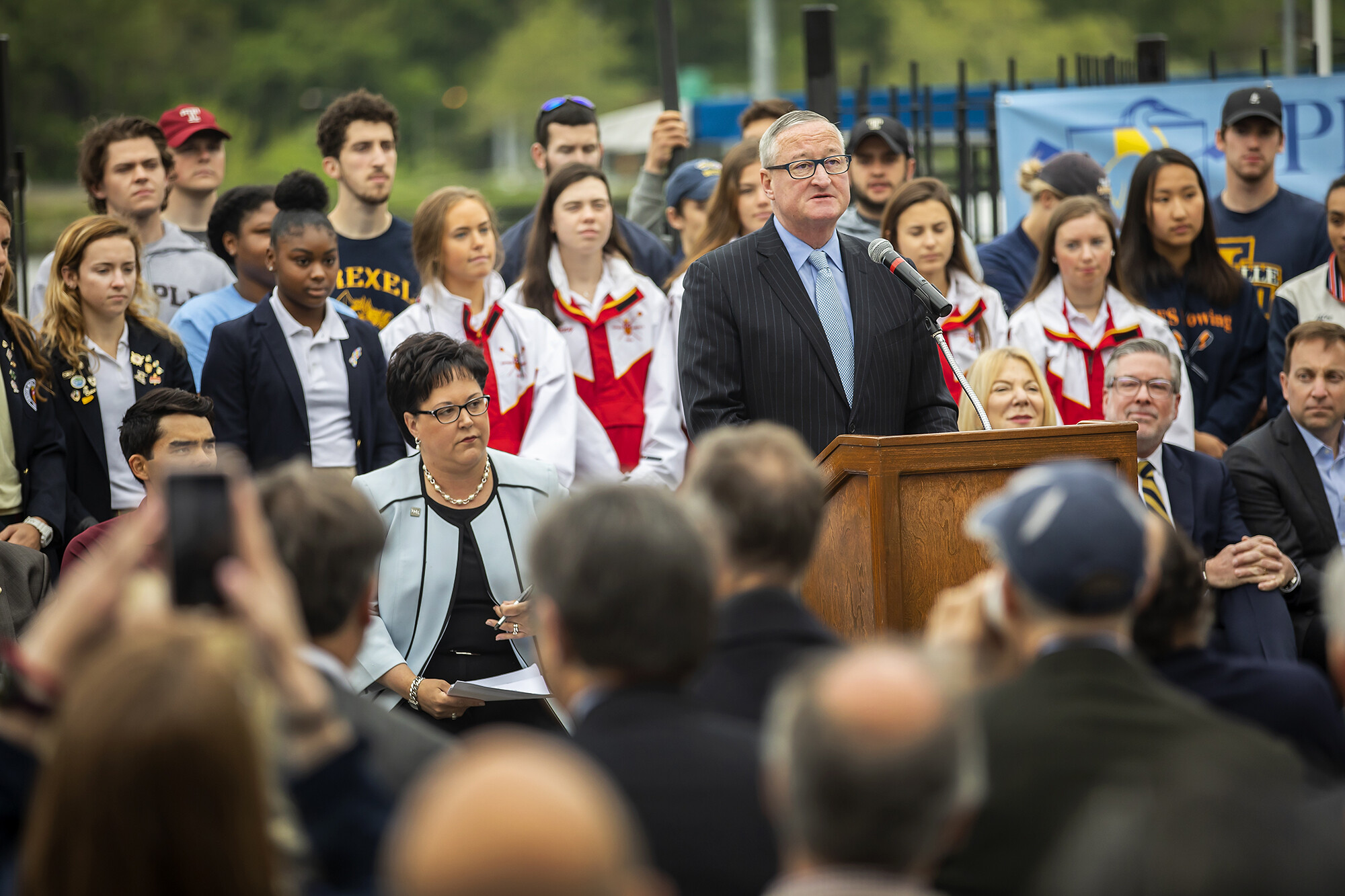 Mayor Jim Kenney addresses the crowd at the podium.