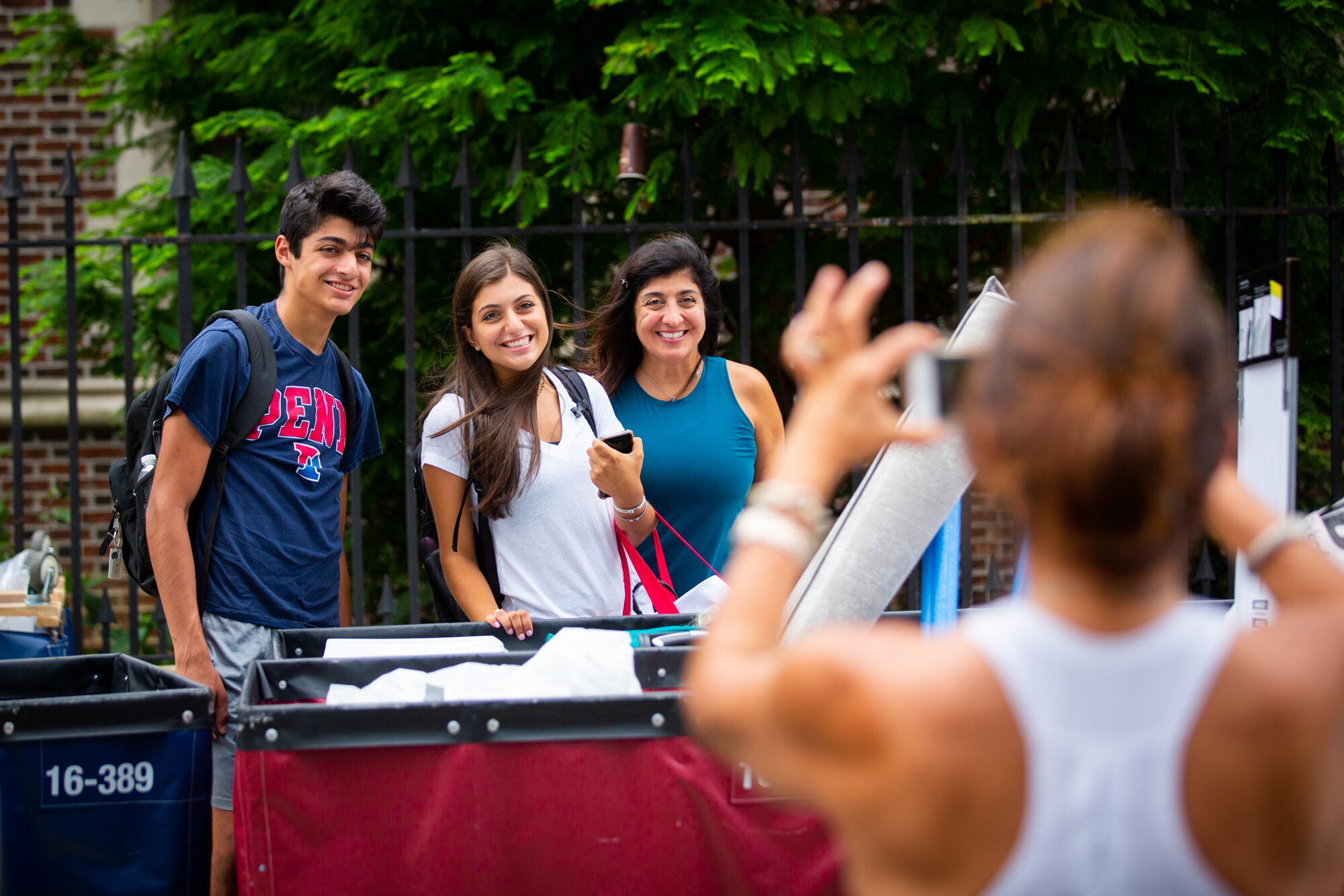 students posing for a photo at the quad