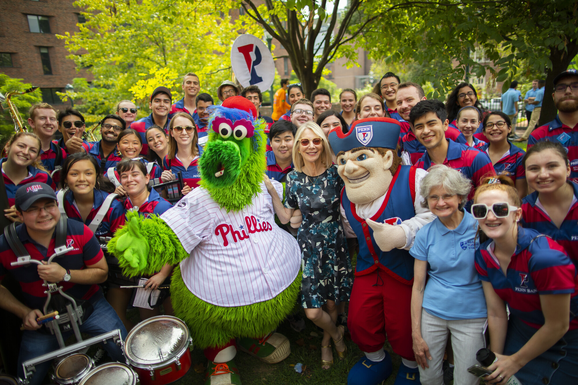 penn president amy gutmann with mascots