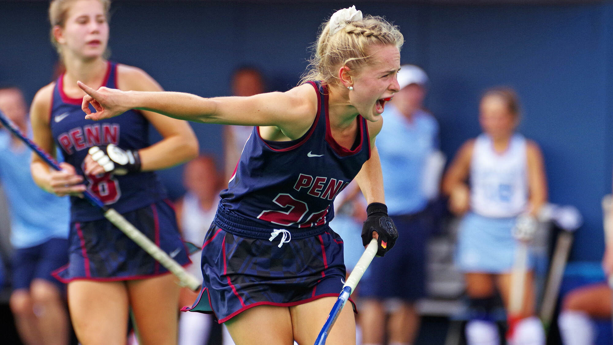 Maddy Fagen of the field hockey team communicates with a teammate during play.