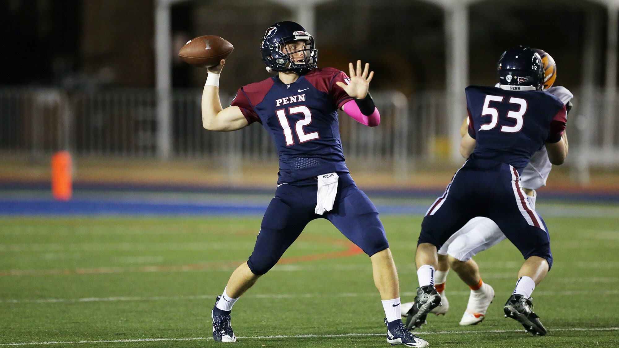 Eddie Jenkins of the Penn sprint football team throws a pass.