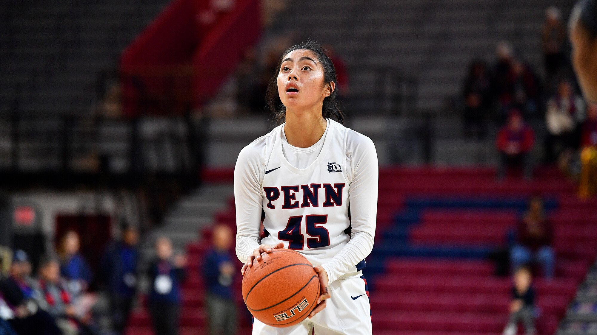 Freshman Kayla Padilla of the women's basketball team prepares to shoot a shot a the Palestra.
