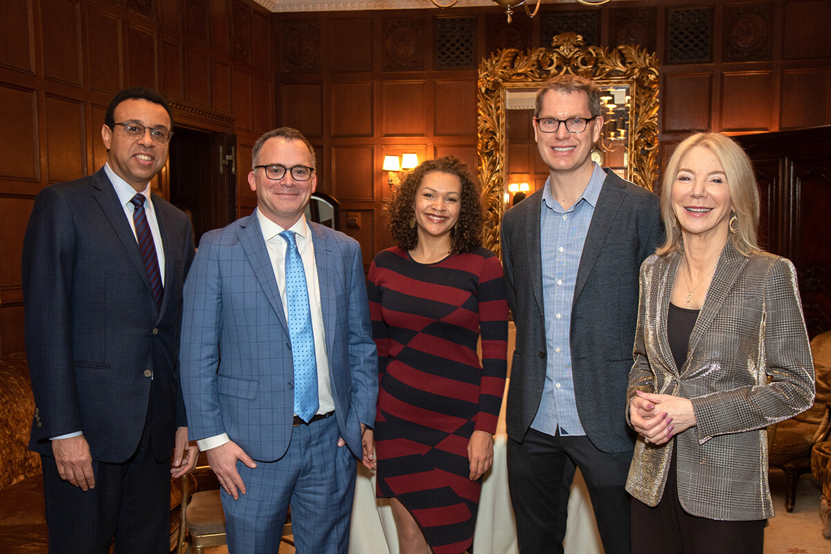 Provost and President pose with speakers at Engaging Minds