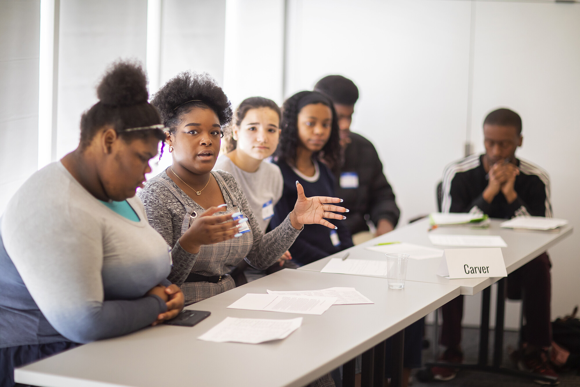 carver high school students during the ethics bowl at the perry world house