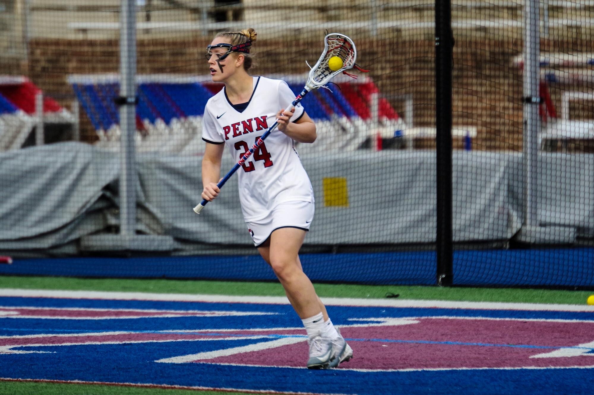 Rosenzweig running with a ball in the stick