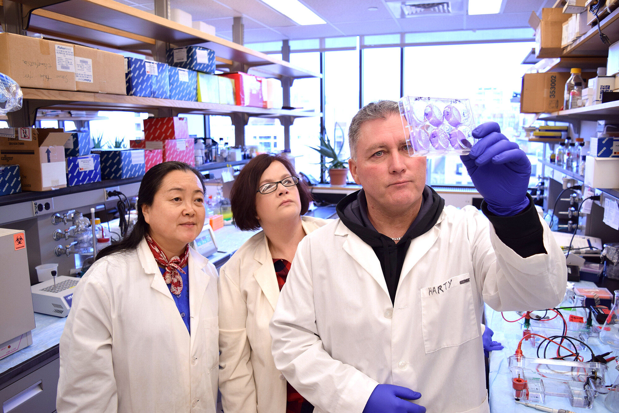 ronald harty with lab members at penn vet