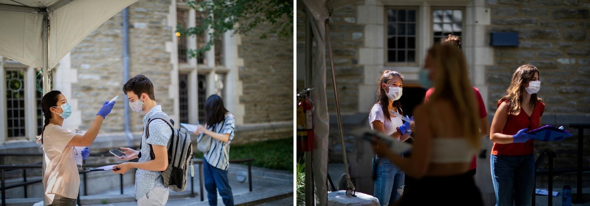 Students outside Houston Hall, one is getting their forehead scanned for a temperature check, others stand wearing face masks holding clip boards.
