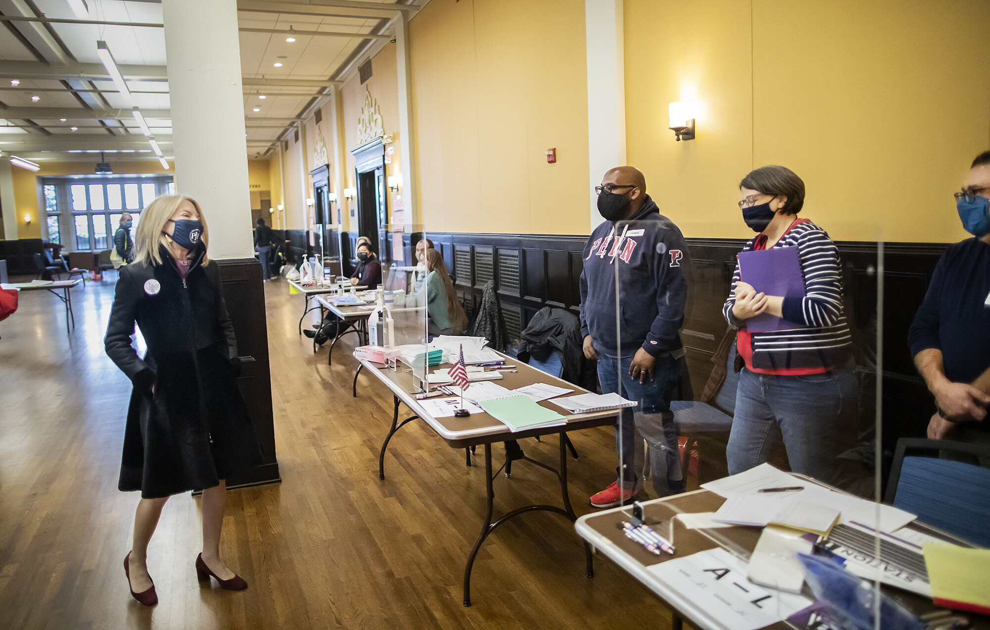 Gutmann greets poll workers at Houston Hall