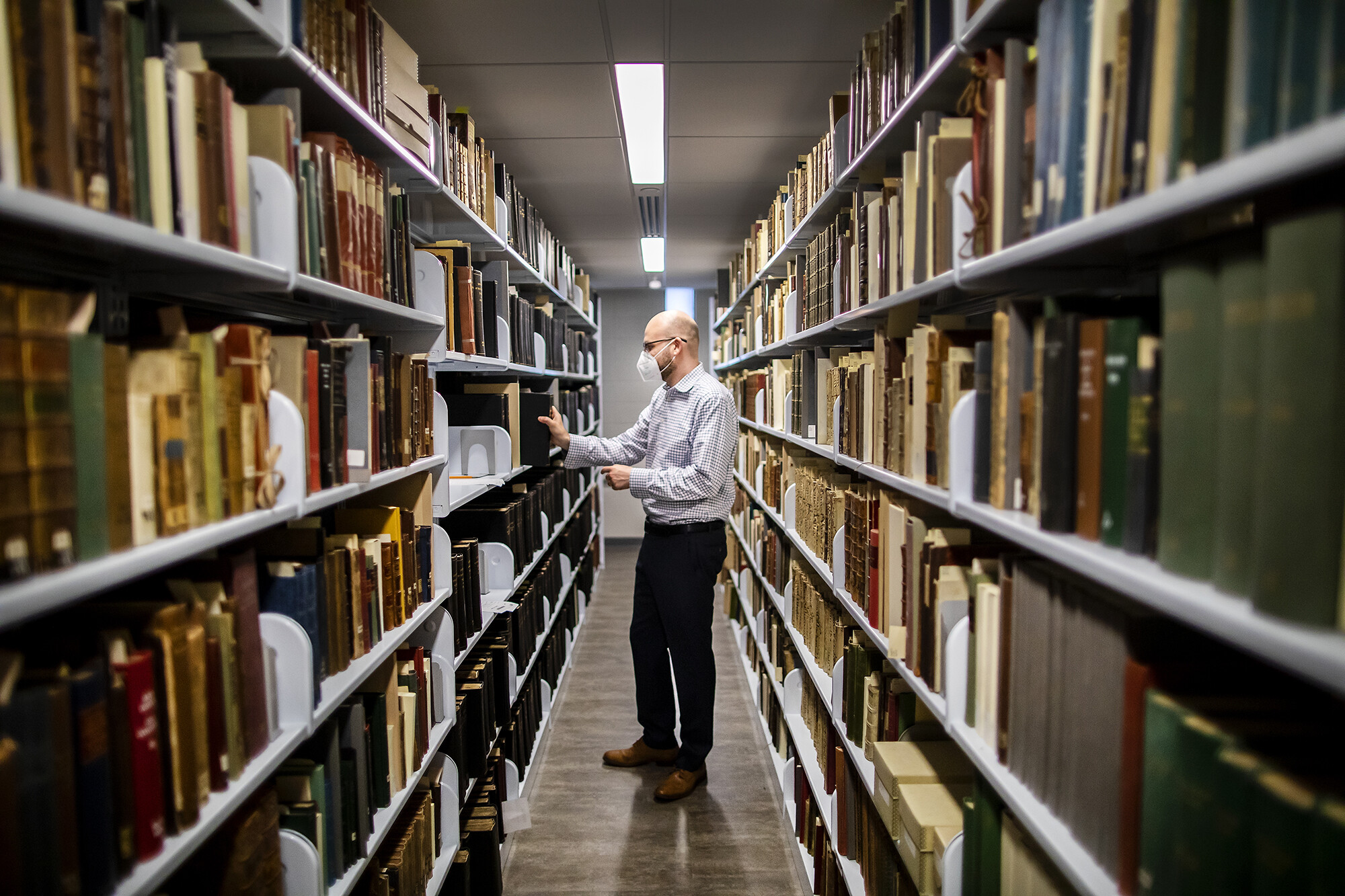 library staff in stacks
