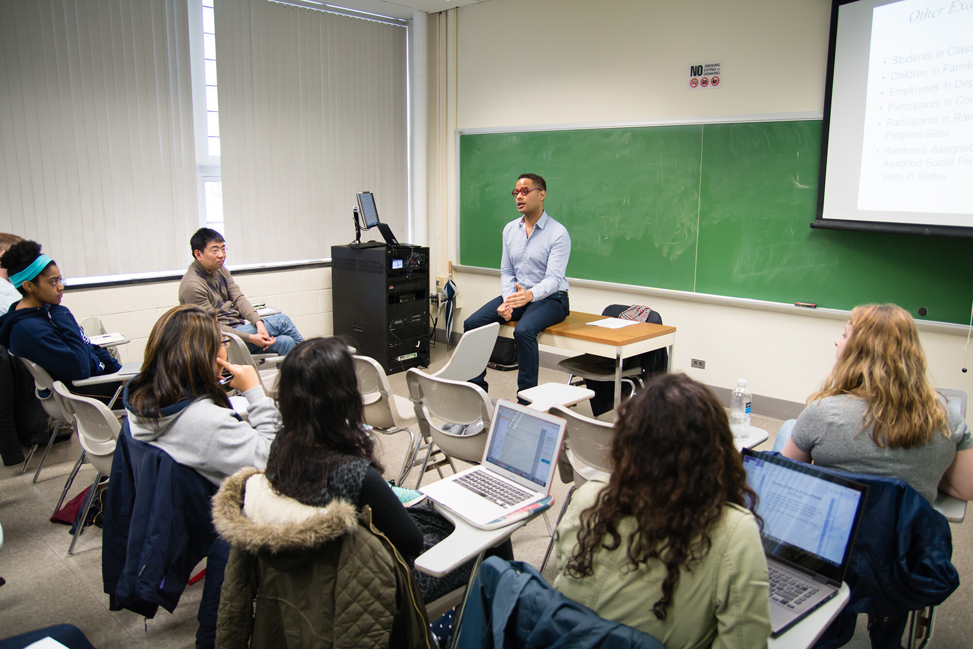 zeke dixon roman teaching in a classroom