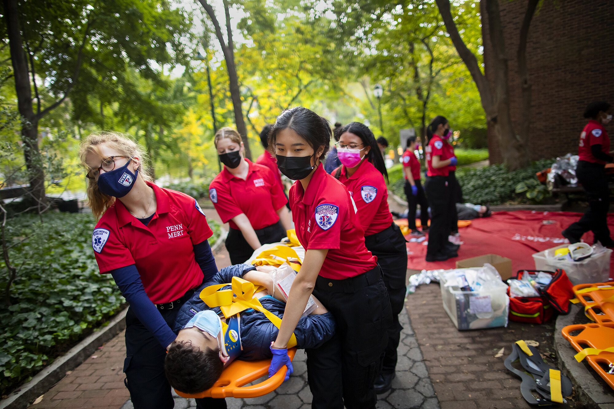 mert students carrying patient on stretcher