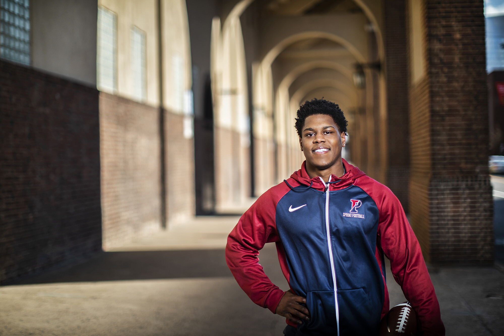 Laquan McKever poses outside Franklin Field.