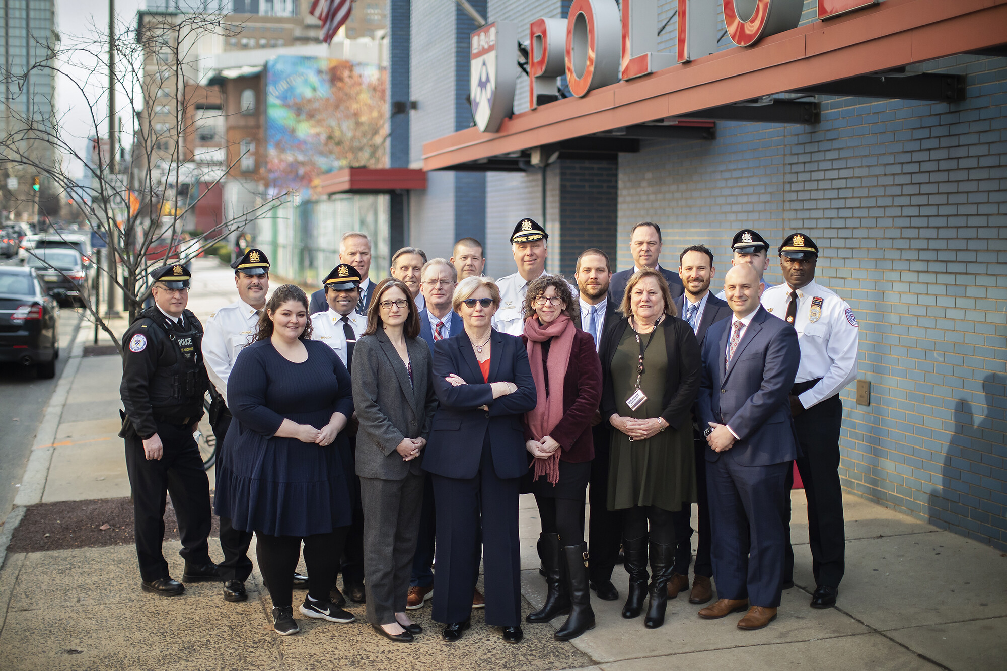Maureen Rush with her team in front of Police headquarters