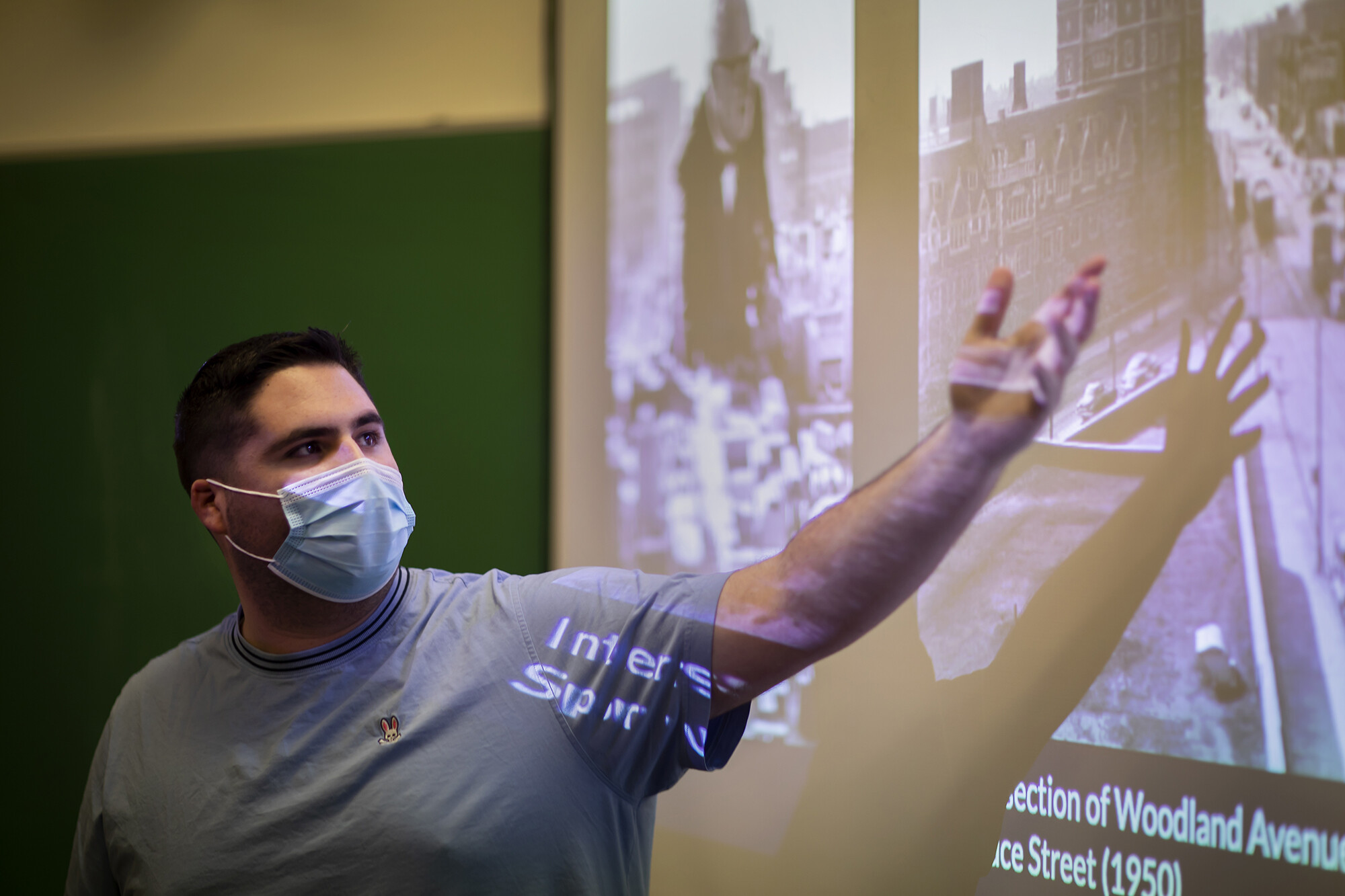 a student presents in the memorials class
