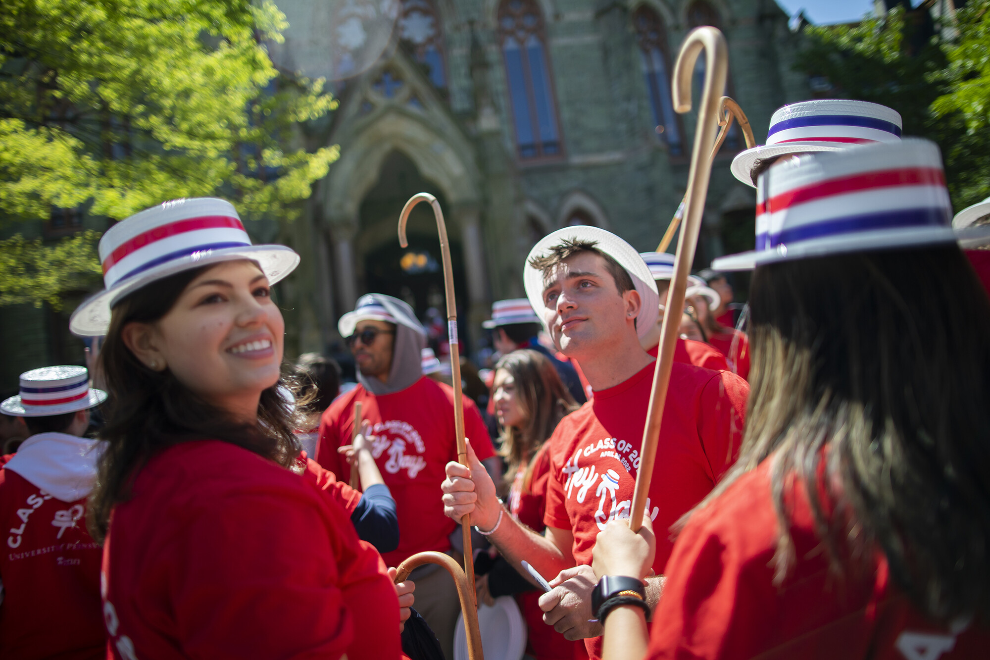 students in front of college hall with canes