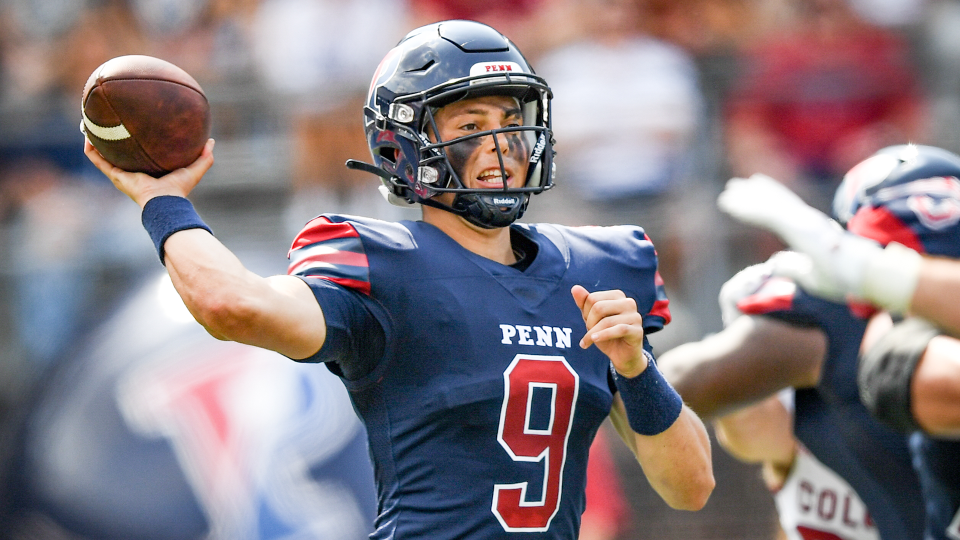 Sayin is set to release the ball from his hands during a pass play.