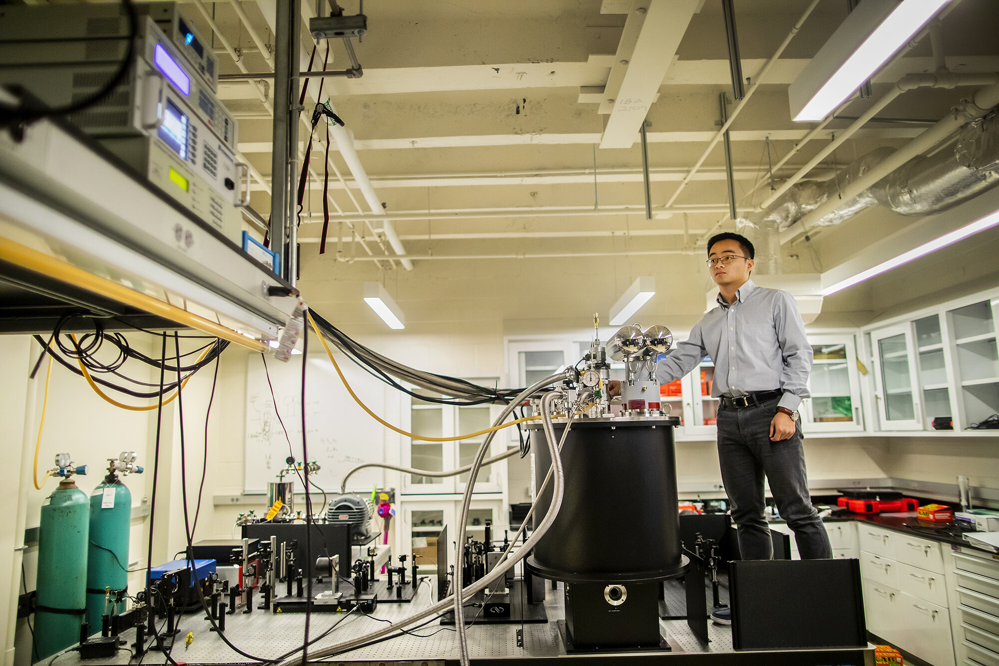 Liang Wu working on kagome materials in a lab. 