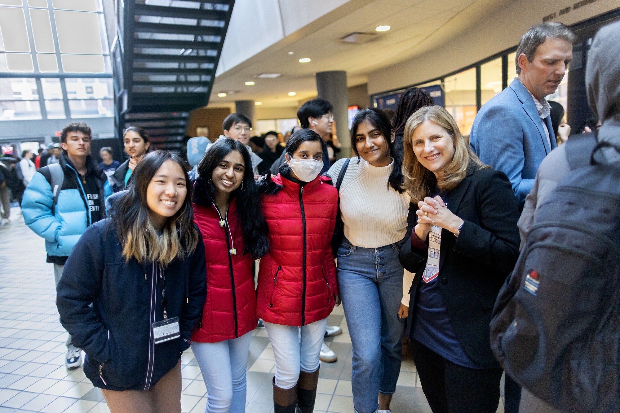 President Liz Magill poses with students at the Pottruck Center birthday bash on Friday, Jan. 20.