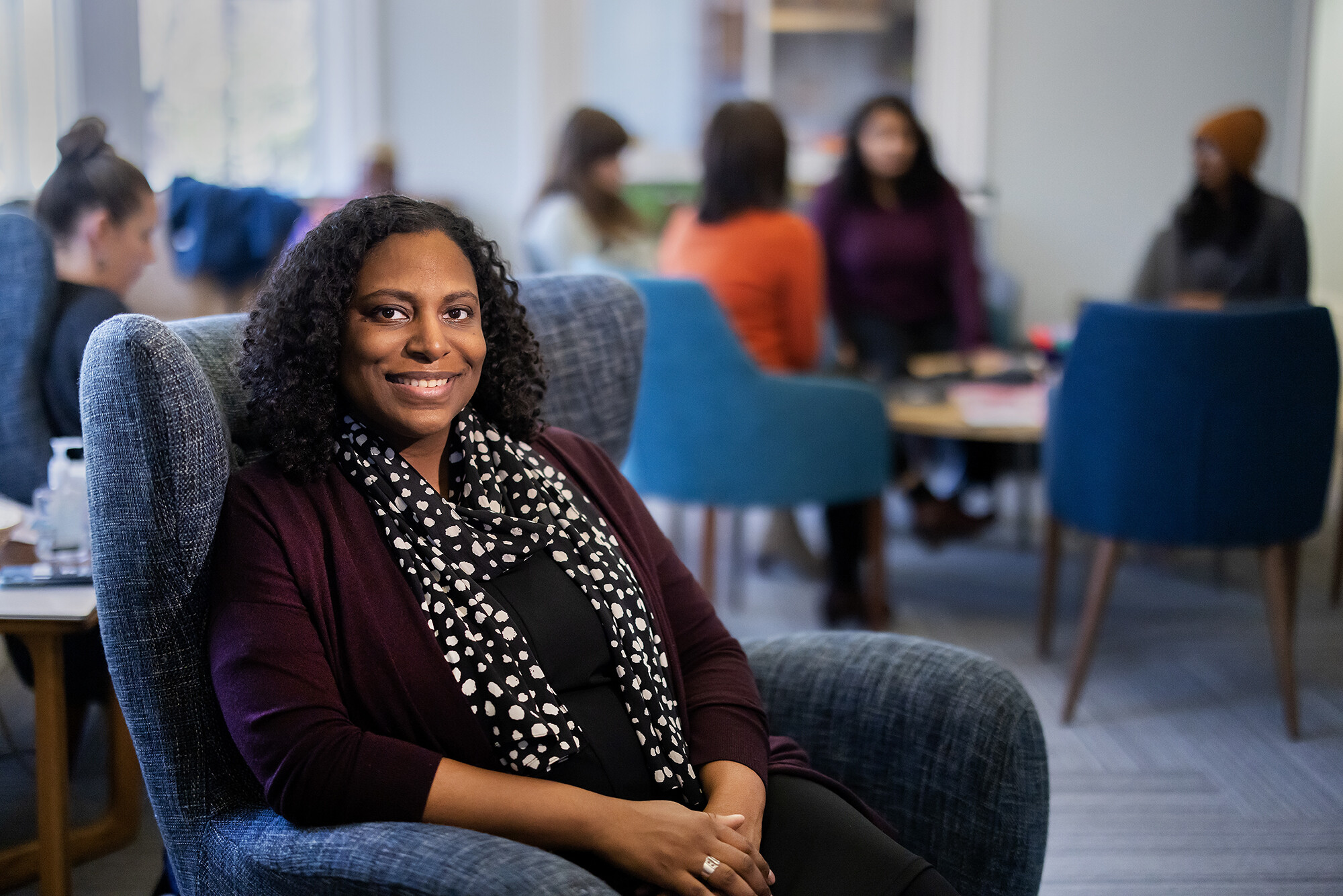Elisa Foster sits in a chair at the Penn Women's Center