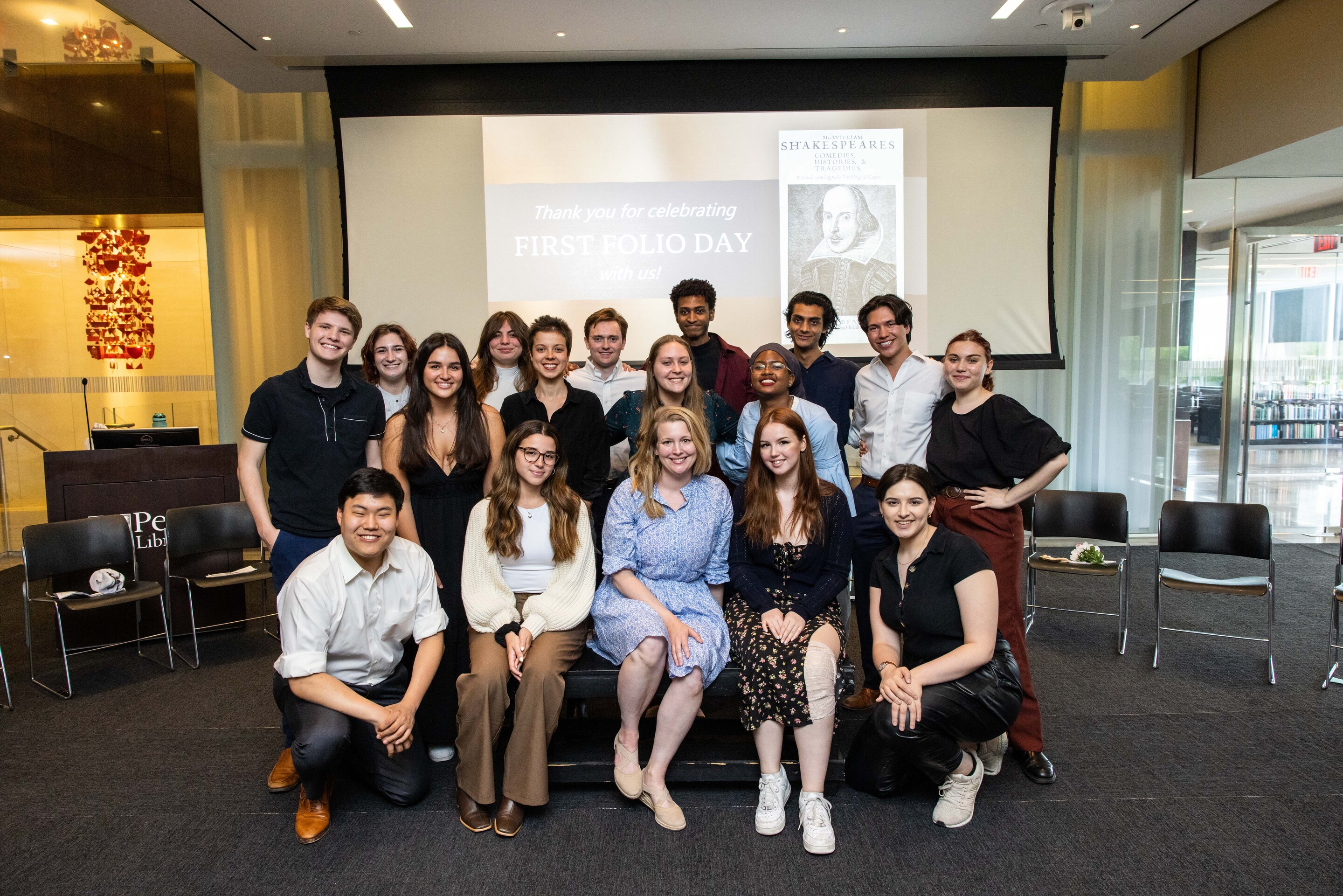 Sixteen students and their teacher assembled in a group.