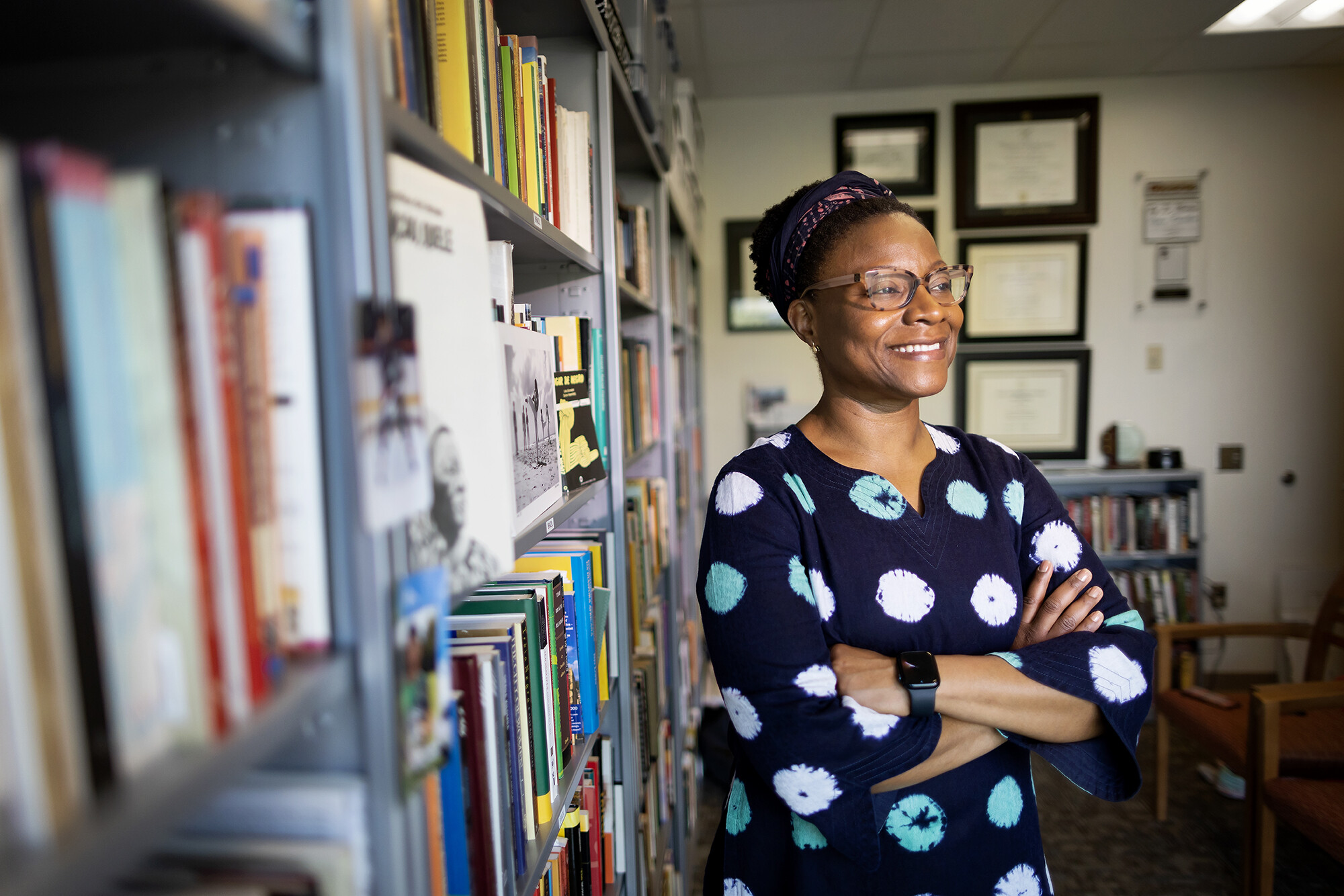 Keisha-Khan Perry in her office, surrounded by books