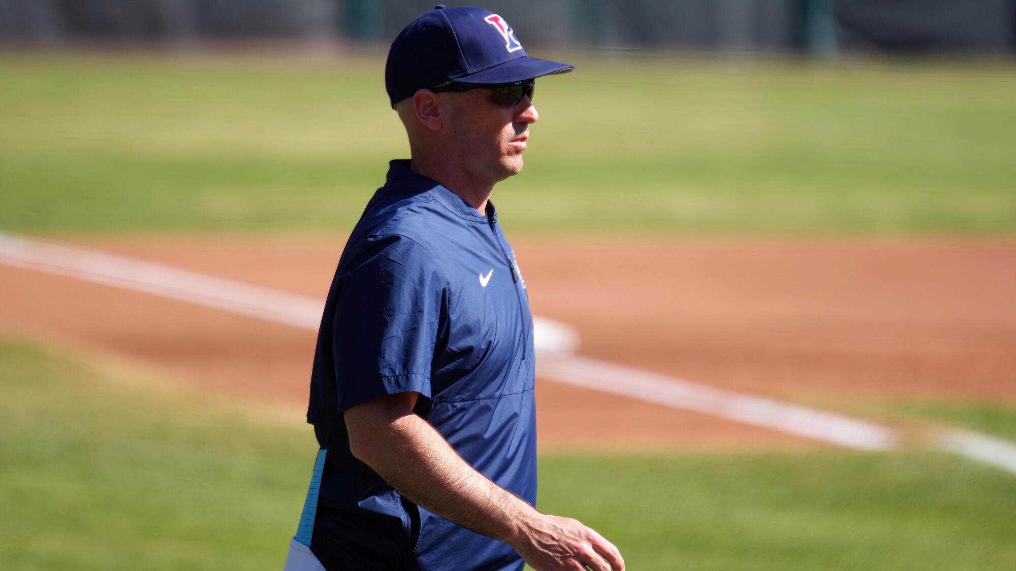 John Yurkow walks onto the baseball diamond