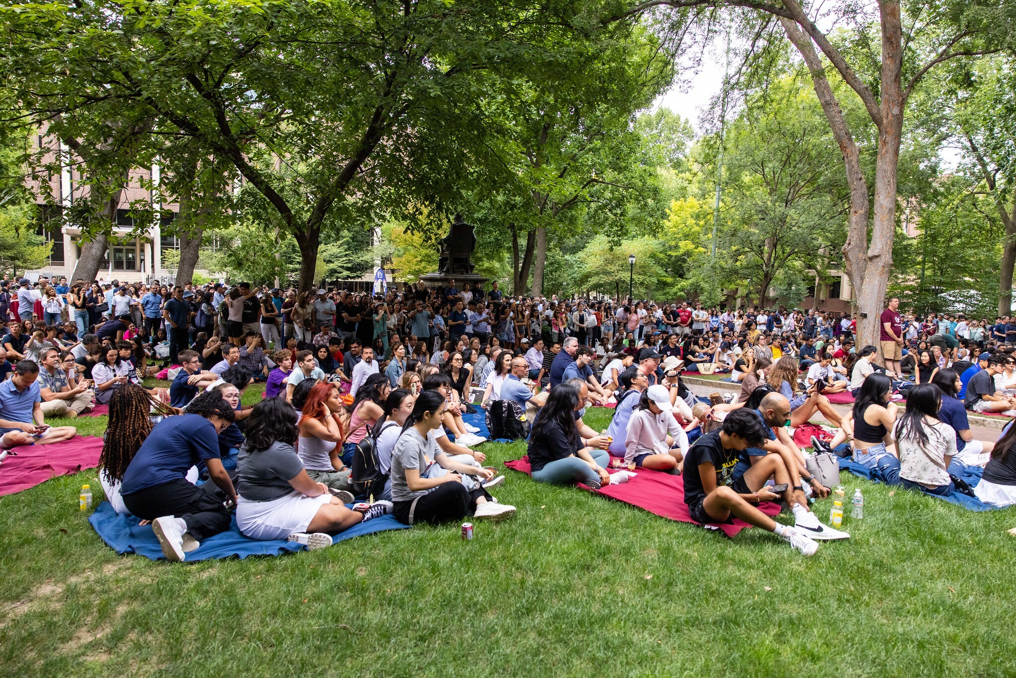 Hundreds of students and families gathered on College Green. 