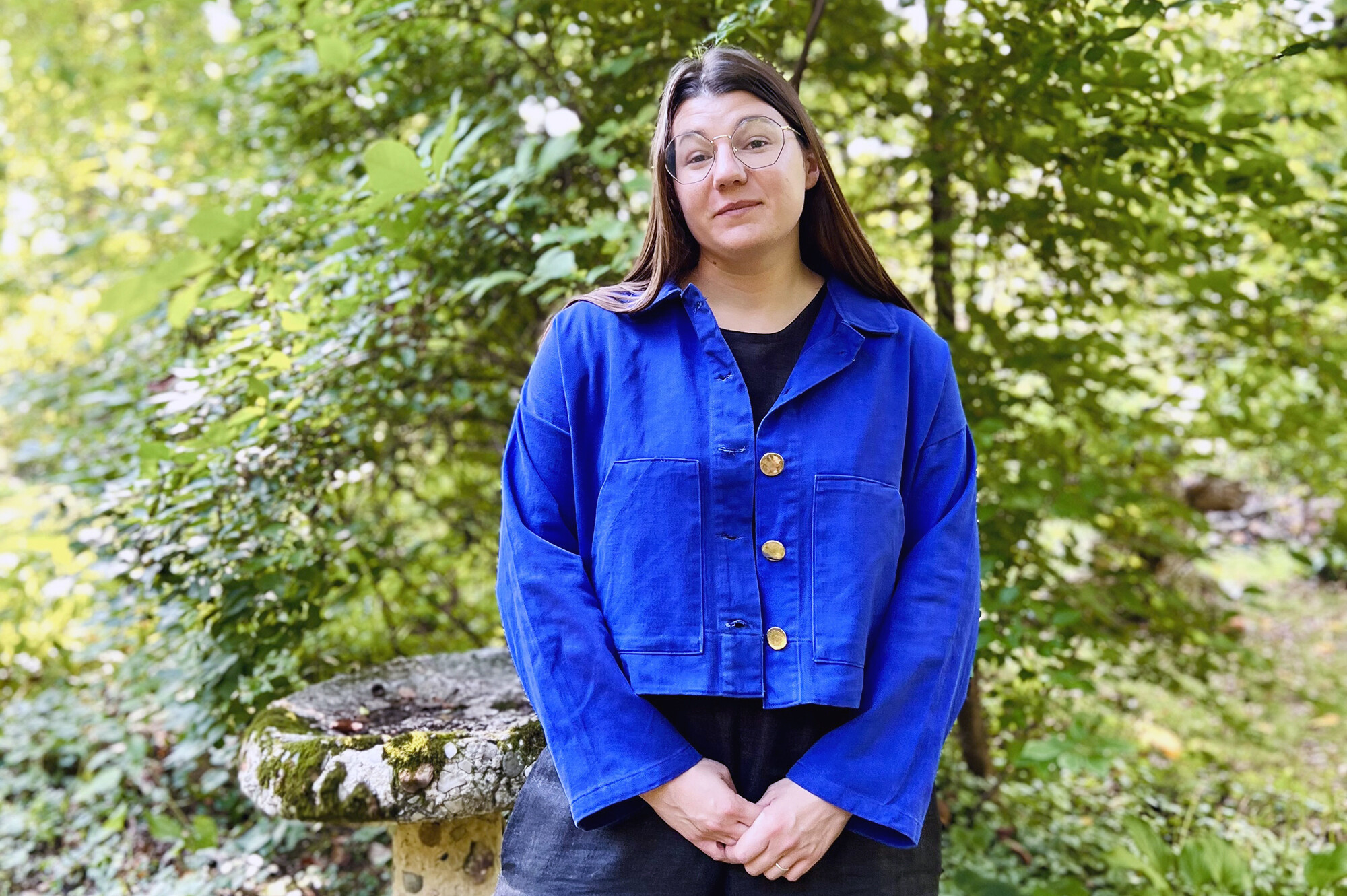 Jimil Ataman wears a blue jacket she made.